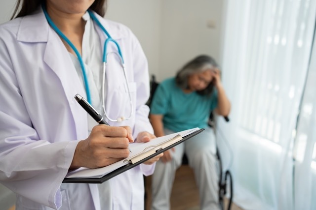 Nurse completing electronic clinical documentation on a dbtech downtime workstation during an EHR outage using eForms with barcode label printing