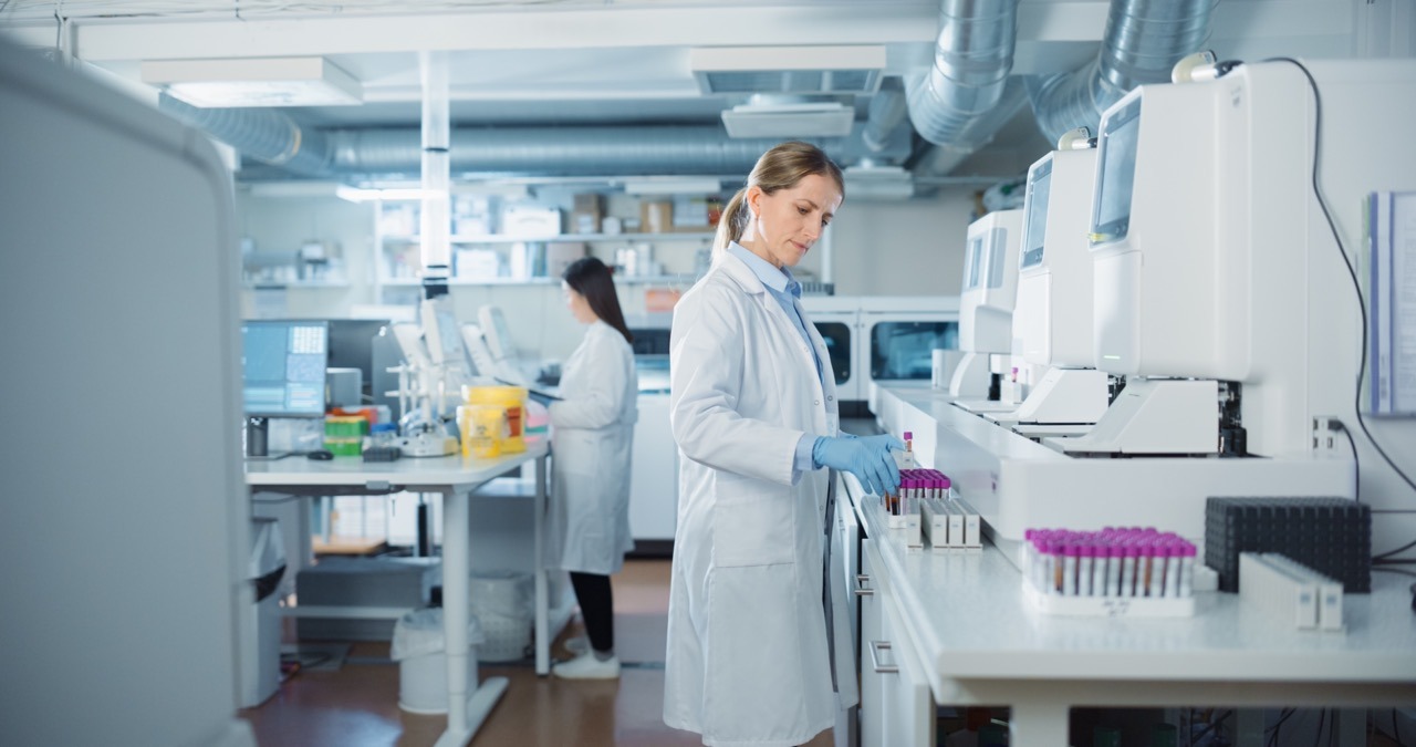 Clinical lab staff managing specimen orders and labels from a downtime workstation during an EHR outage