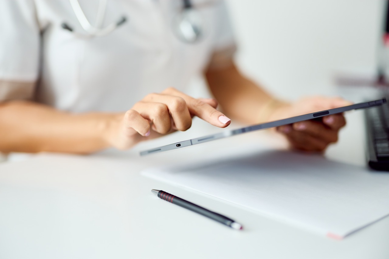 Healthcare IT administrator using dbtech data archiving platform to manage long-term EHR records retention and HIPAA-compliant clinical data storage