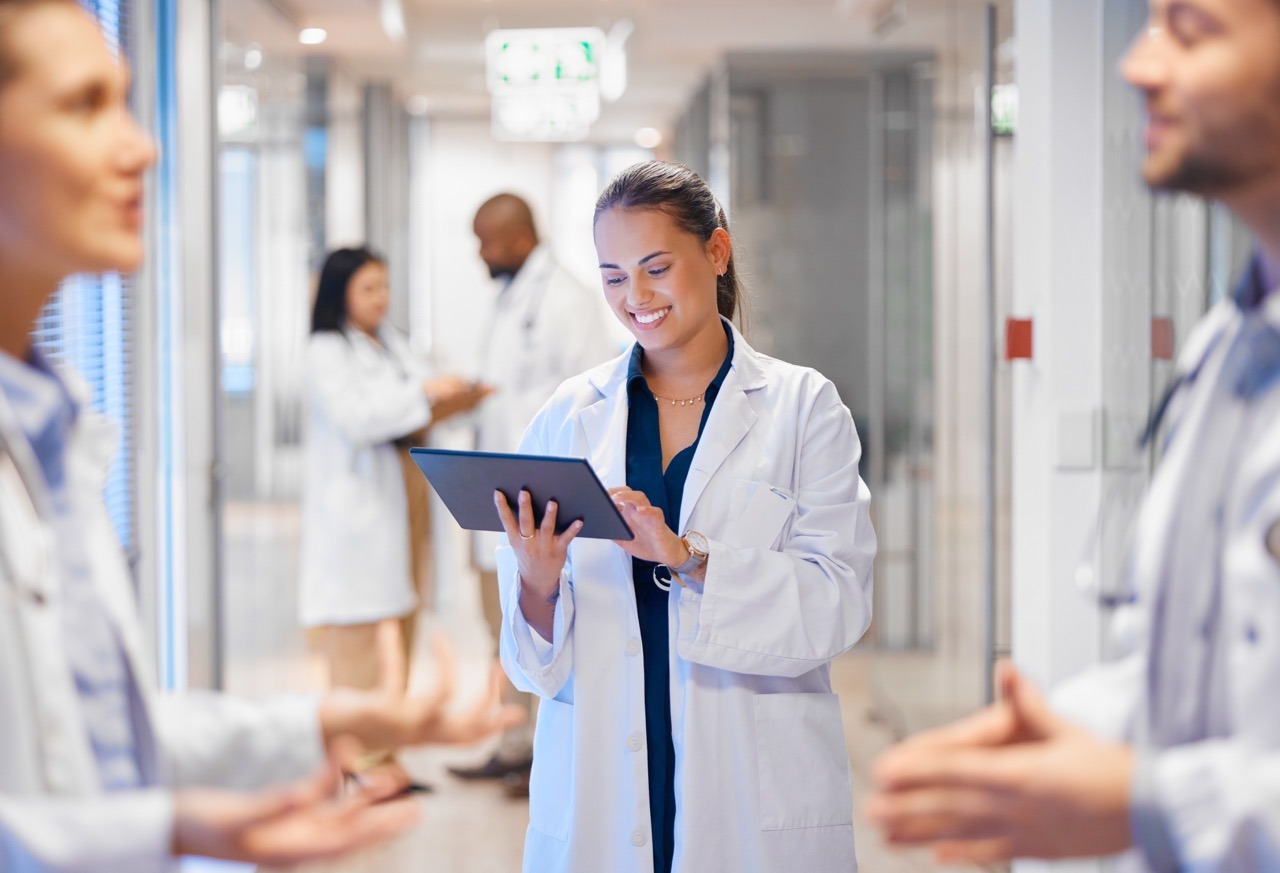 hospital CFO reviewing a financial ROI calculation for a downtime solution investment