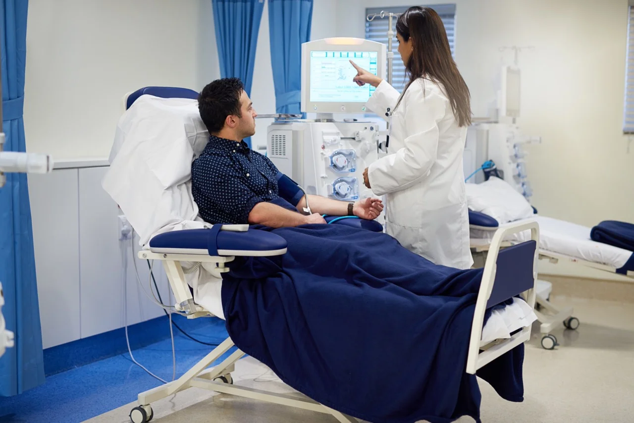 Clinical staff managing a dialysis treatment workflow during an EHR downtime event