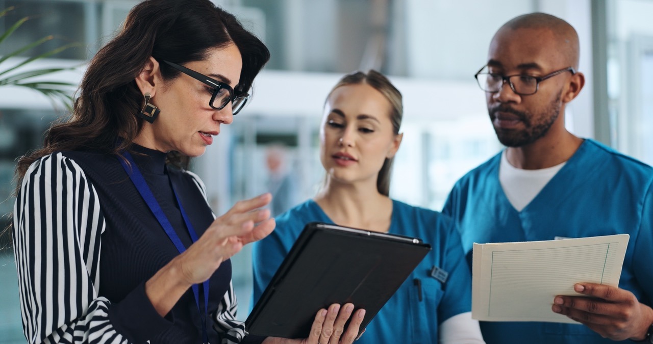 Healthcare IT team reviewing a downtime preparedness maturity assessment dashboard