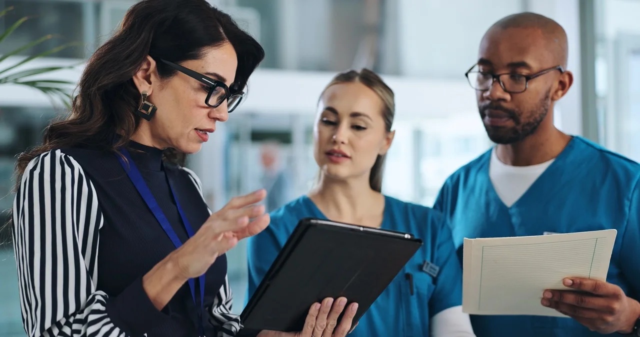 Healthcare IT team reviewing a downtime preparedness maturity assessment dashboard