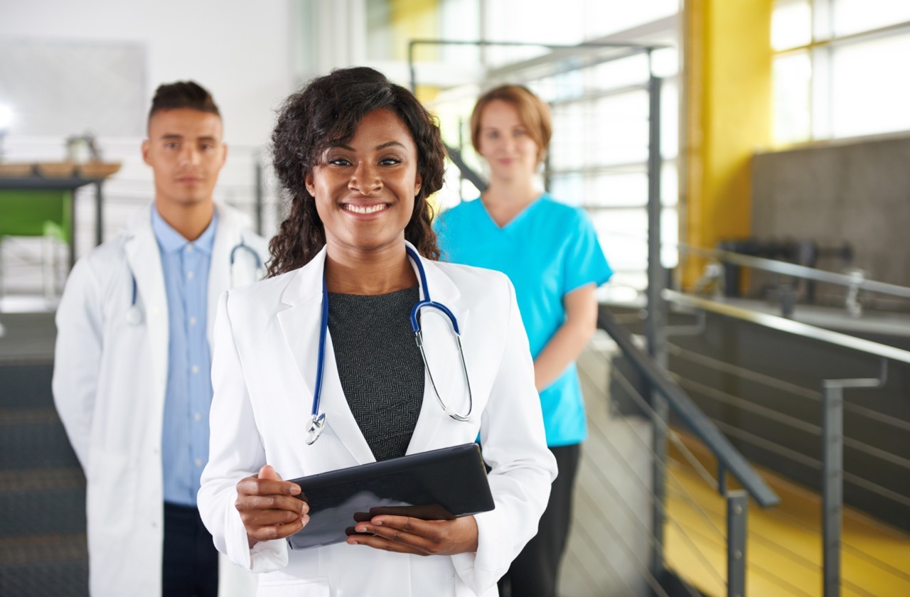 Health information management staff auditing paper forms before a healthcare eForms conversion