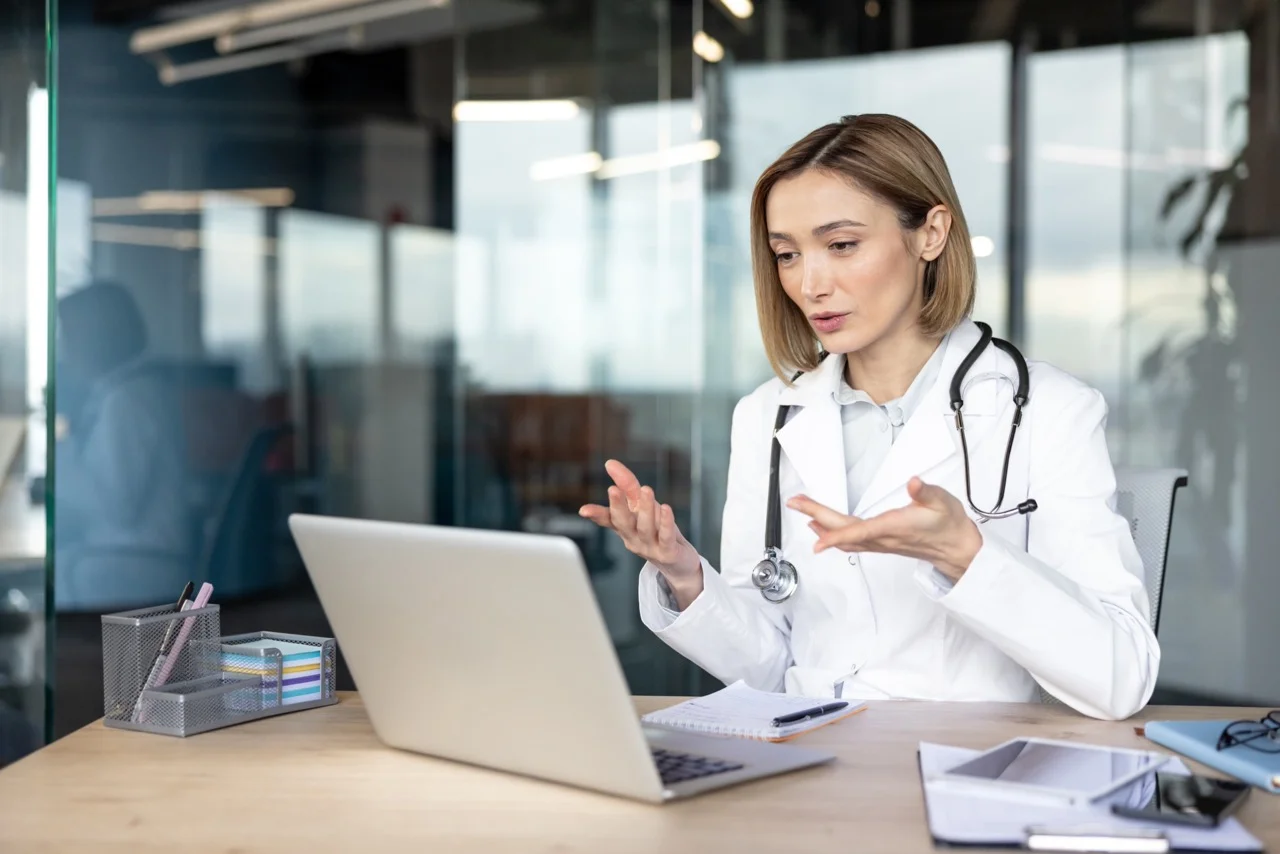 Physician on a telehealth video visit, a common telehealth downtime scenario